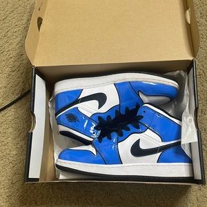 Blue and white air Jordan 1 mids